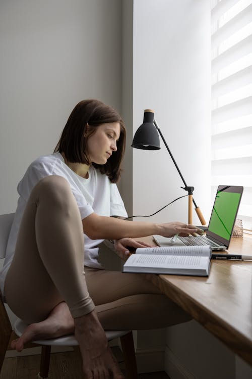 Young woman studying for the NREMT exam.