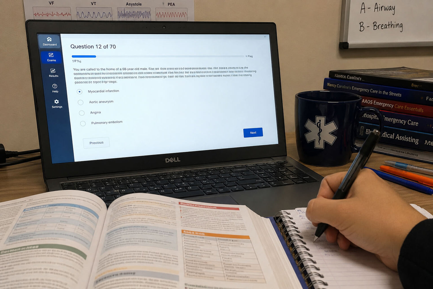 Person taking an NREMT practice exam on a laptop while studying with an emergency care textbook and handwritten notes.