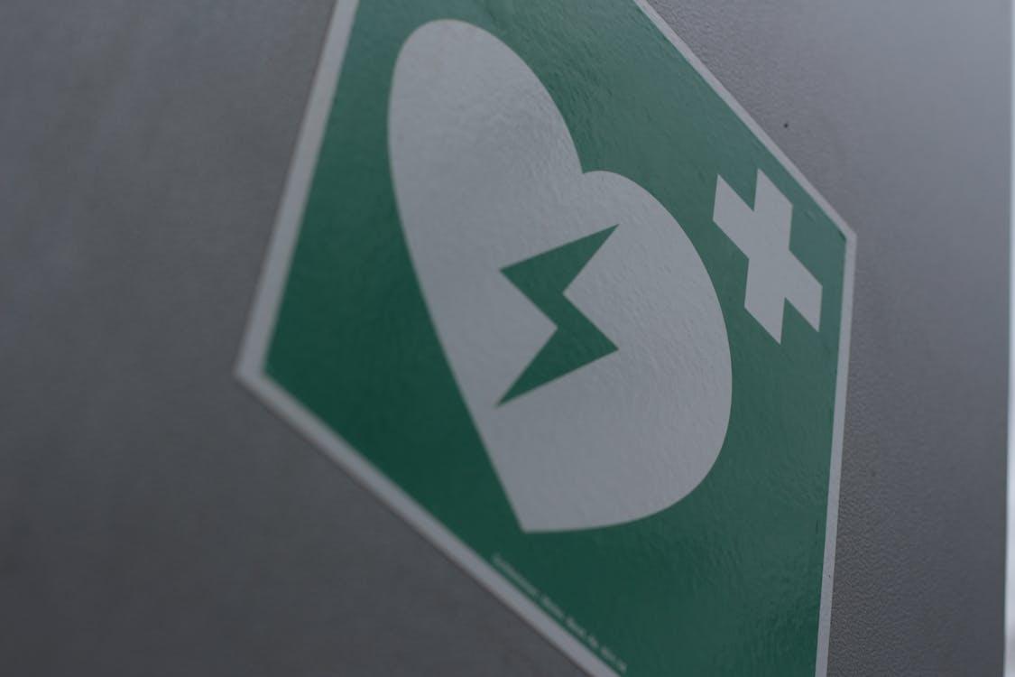 Medical heart icon with a plus sign representing healthcare certification