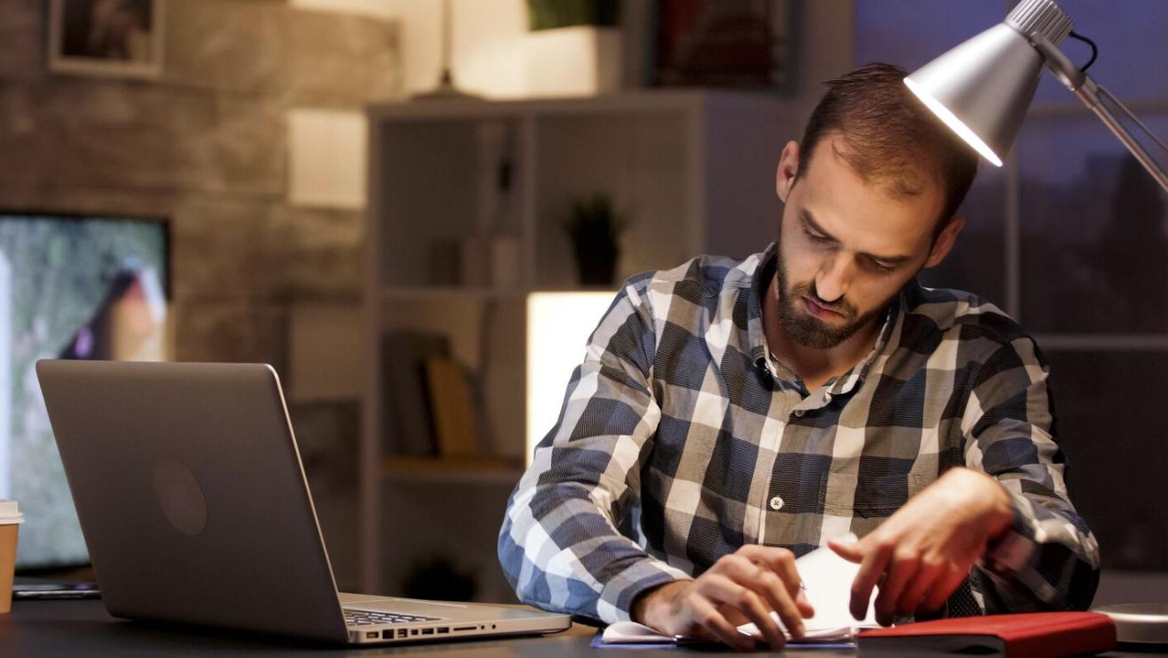 A man sitting at a desk