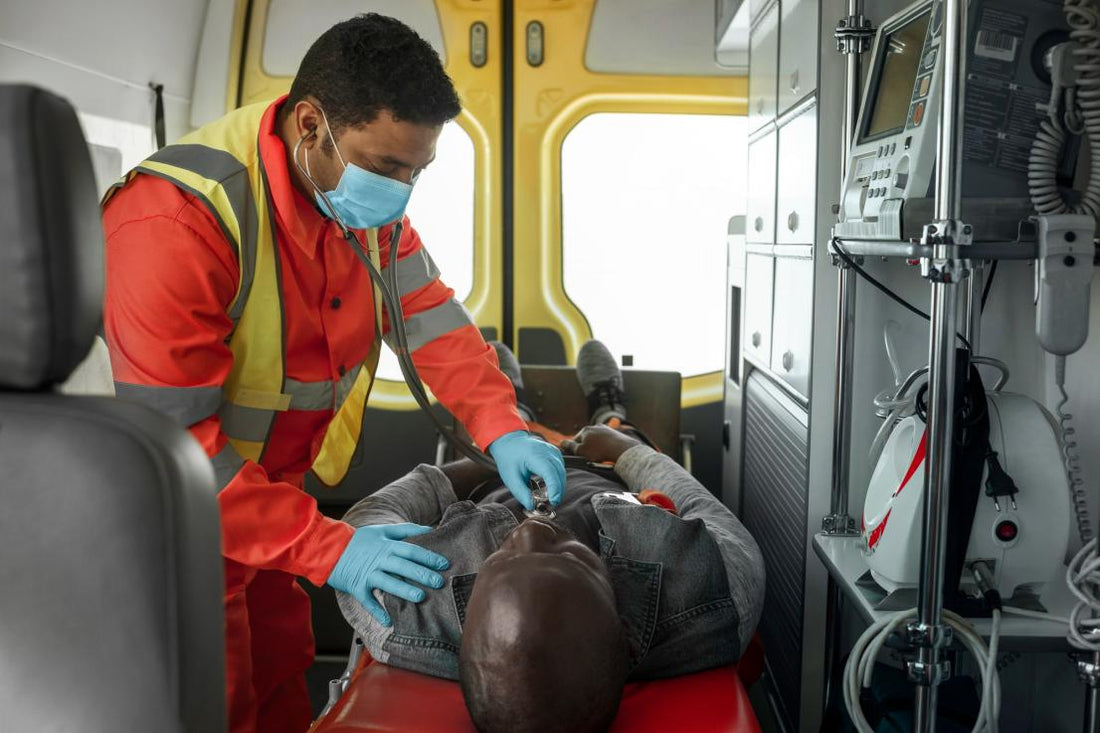 Paramedic assessing a patient at an emergency scene, checking condition and responsiveness during prehospital care